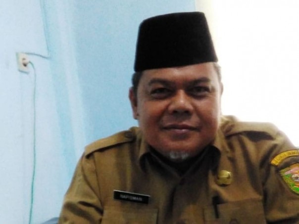 Plt Dinas Sosial Pemberdayaan Masyarakat dan Desa Kabupaten Kuantan Singingi, Drs. Nafisman, M.Si/zar