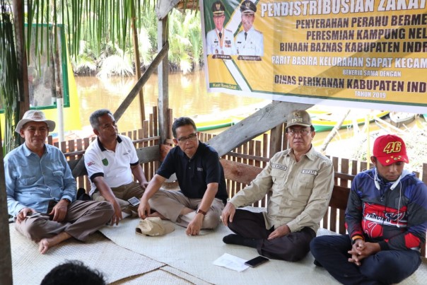 Bupati Inhil, HM Wardan meresmikan Parit Basirah, Kelurahan Sapat, Kecamatan Kuala Indragiri/adv