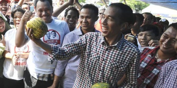 Jokowi saat menyapa masyarakat (foto/int) 