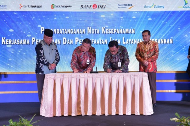 Penandatanganan kerjasama antara Bank Riau Kepri dengan BRI