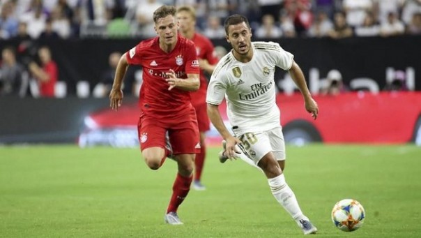 Eden Hazard memulai debut bersama Madrid dalam laga menghadapi Bayern Munich. Foto: int 