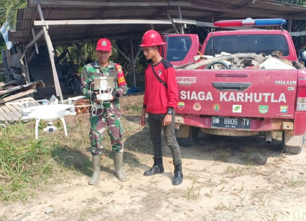 Dilengkapi Drone, Babinsa Koramil 10/KDS Dengan PT BDB Patroli Wilayah Rawan Karhutla (foto/istimewa)