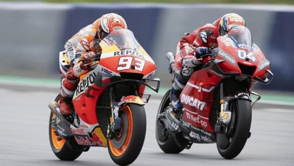 Marc Marquez dan Andrea Dovizioso saling balap di MotoGP Austria. Foto: int 
