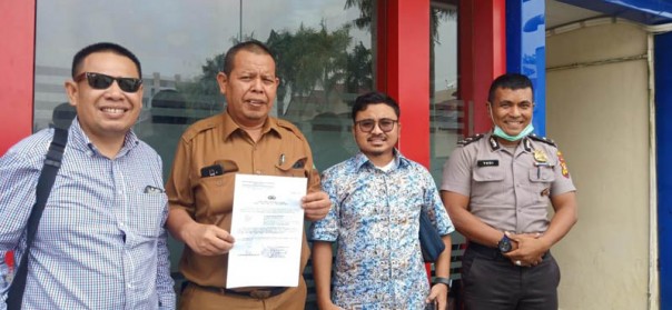 Kadis PU Siak, Ir Irving Kahar Arifin ME, Senin (9/9/2019), melaporkan Cep Permana Galih ke Polda Riau/ist