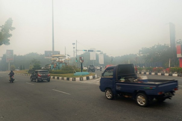 Jarak pandang di Kota Pekanbaru 300 meter (foto/amri)
