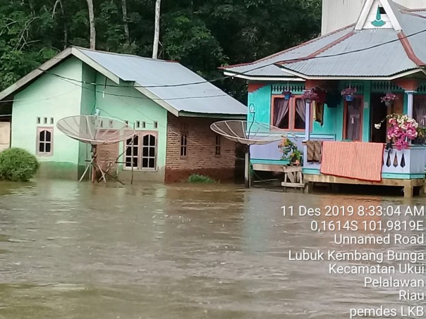 Banjir yang terjadi di Desa Lubuk Kembang Bunga Kecamatan Ukui, mulai surut (foto/int)