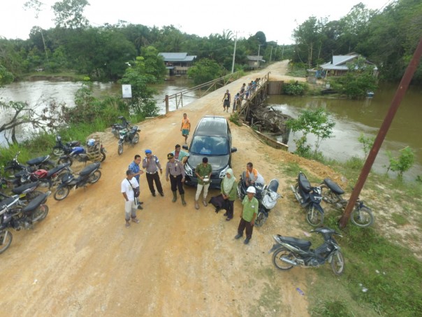 Kondisi banjir di Desa Lubuk Kembang Bunga Kecamatan Ukui, sudah surut (foto/Ardi)