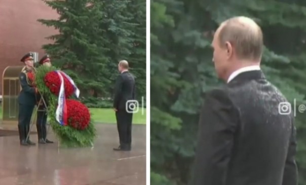 Presiden Rusia Putin tak mau pakai payung saat memberi karnagan bunga pad atentara yang gugur di Perang Dunia II (foto/int)