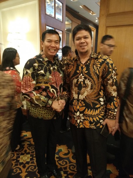 Ketua DPRD Kuansing Andi Putra saat bersama Walikota Pekanbaru Firdaus (foto/Zar)