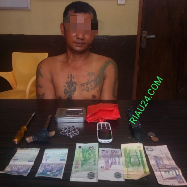 orang pelaku tindak pidana pencurian di sebuah rumah di Jalan Kelapapati Darat, Kecamatan Bengkalis, Kabupaten Bengkalis ditangkap warga (foto/Hari)