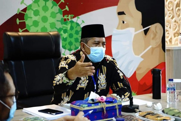 Bupati Siak, Alfedri minta jangan ada warganya apalagi PNS berangkat ke Pekanbaru (foto/Lin)