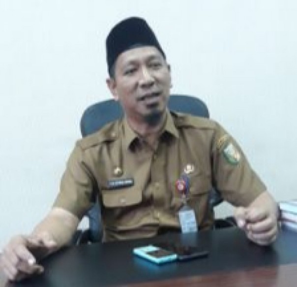 Kadis Dukcapil Kuansing HM Refendi Zukman, AP. M.Si (foto/Zar)