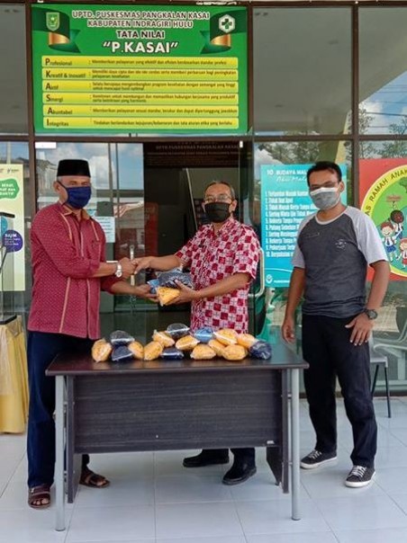 Ketua DPRD Inhu Serahkan Bantuan Masker (foto/int)