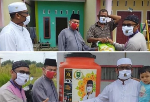 Anggota DPRD Siak Kusman Jaya Berikan Bantuan Perlengkapan Cuci Tangan Untuk Warga Kandis (foto/ist)