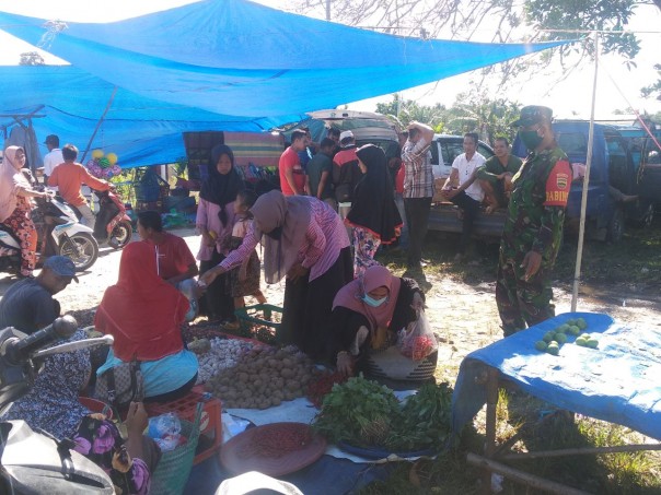 Sambangi Pasar Tradisional, Kopka Jufri Hendri Sosialisasikan Protokol Kesehatan