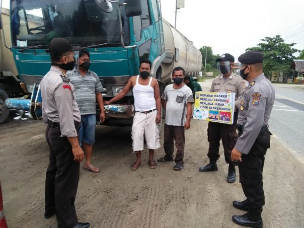 Polsek Bandar Sei Kijang Himbau Pengguna Jalan Lintas Timur Patuhi Prokes