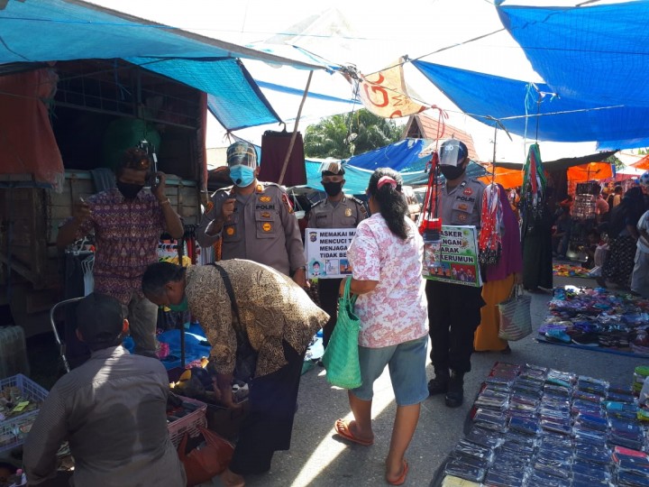 Polsek Bandar Sei Kijang Imbau Warga Patuhi Protokol Kesehatan di Pasar Tradisional