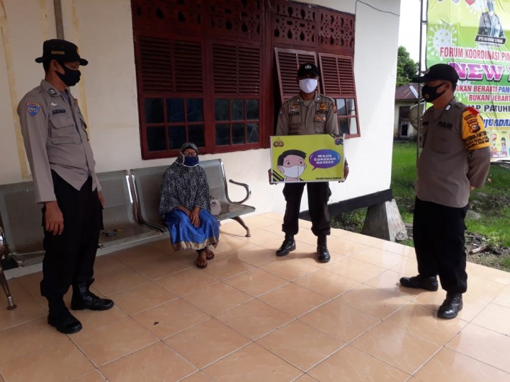 Antisipasi Covid-19, Polsek Kuala Kampar Himbau Warga Patuhi Protokol Kesehatan