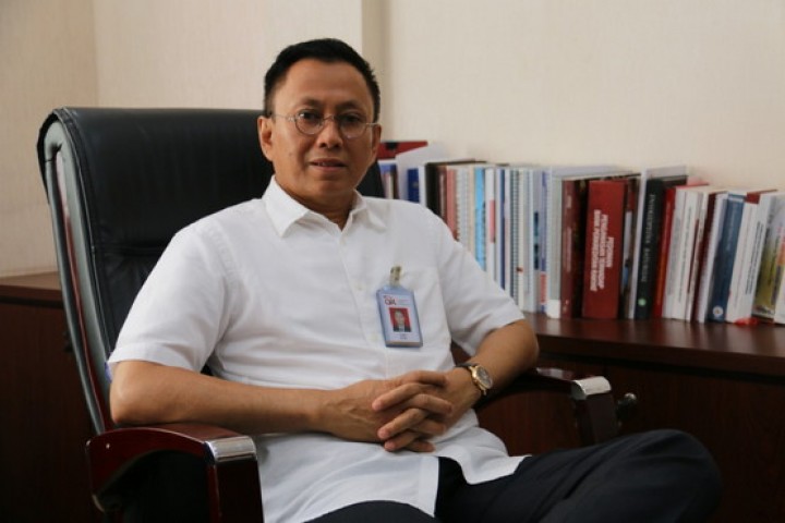 Kepala OJK Riau, Yusri