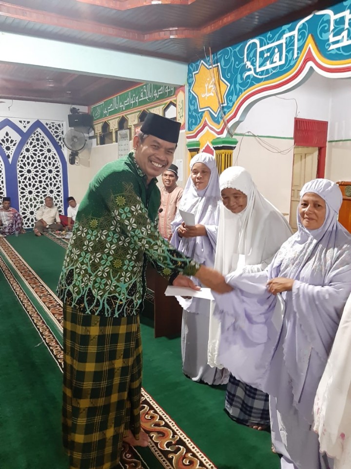 Silaturahmi dengan Warga Muhammadiyah, PCM Muhammadiyah Lubuk Jambi Juga Serahkan Bantuan (foto/zar) 