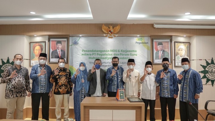 PT Pegadaian (Persero) Kanwil II Pekanbaru melakukan penandatanganan Nota Kesepahaman atau MoU dengan Forum Guru Muhammadiyah (FGM). (Foto: Istimewa)