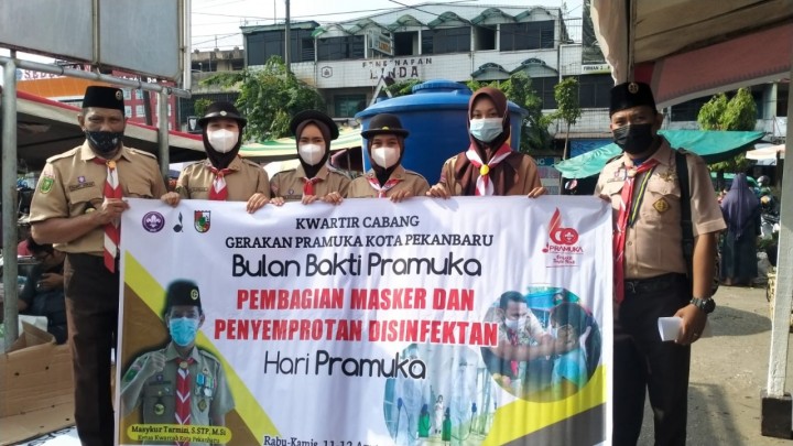 Kwarcab Pramuka Kota Pekanbaru Ingatkan Warga Patuhi Prokes dan Selalu Pakai Masker (foto/ist)