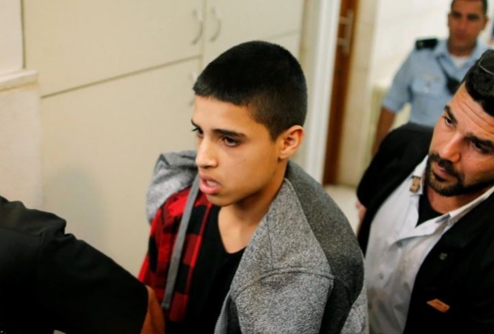 Ahmad Manasra (tengah) awalnya ditangkap pada usia 13 tahun [File: Ammar Awad/Reuters]