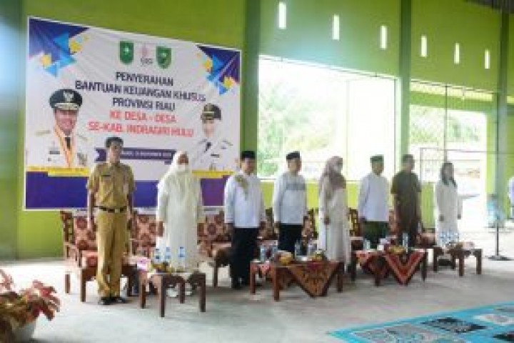 Yulisman Hadiri Kegiatan Penyerahan Bantuan Keuangan Khusus Provinsi Riau Ke Desa-Desa Se Kabupaten Inhu