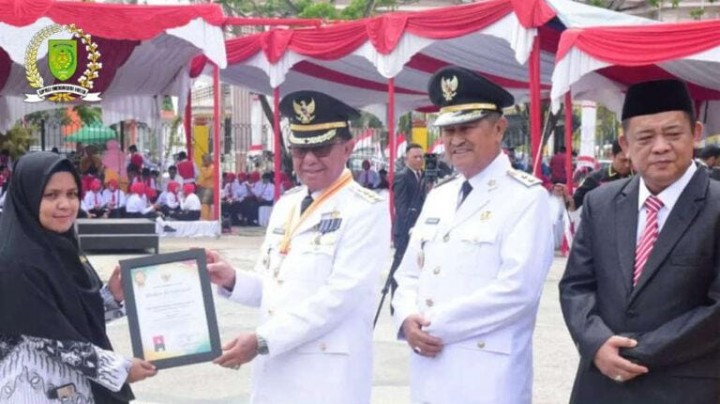 Wakil Ketua DPRD Inhil Edi Gunawan Ikuti Apel HUT RI di Lapangan Gajah Mada Tembilahan.