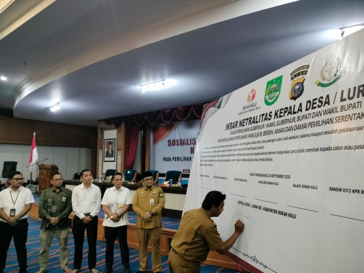 Polres Rohul dan Bawaslu Gelar Ikrar Netralitas Kepala Desa dan Lurah Se-Kabupaten untuk Pilkada 2024