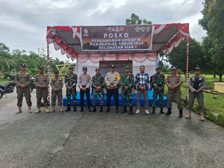 Patroli Gabungan Personil Polsek Siak, TNI, Satpol PP Ke Gudang Logistik PPK Kecamatan Siak Pasca Pemungutan Suara Pilkada Serentak Kabupaten Siak