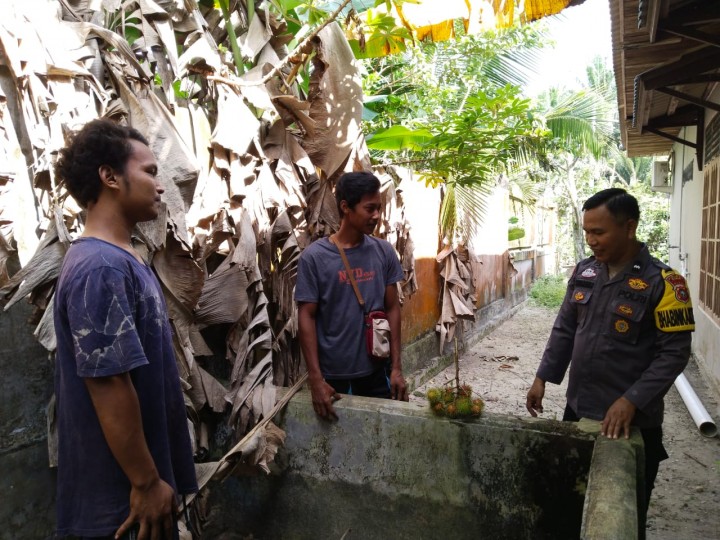 Cooling Sistem Bhabinkamtibmas Kampung Sialang Sakti, Kecamatan Dayun, Aipda Ropinus Butar-Butar Sambangi Warga dan Sampaikan Pesan Kamtibmas Pasca Pilkada Kabupaten Siak