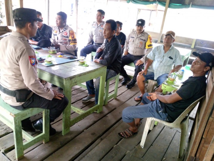 Polsek Tebingtinggi Gelar Cooling System di Pelabuhan Semulut Sampaikan Pesan Kamtibmas Pasca Pilkada