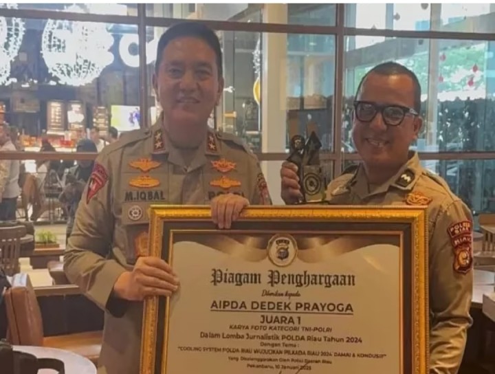 Aipda Dedek Prayoga Harumkan Polres Siak, Juara I Lomba Foto TNI-Polri