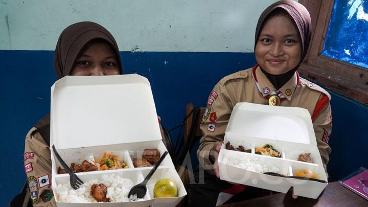 Siswa dan makan bergizi gratis. Sumber: tempo.co