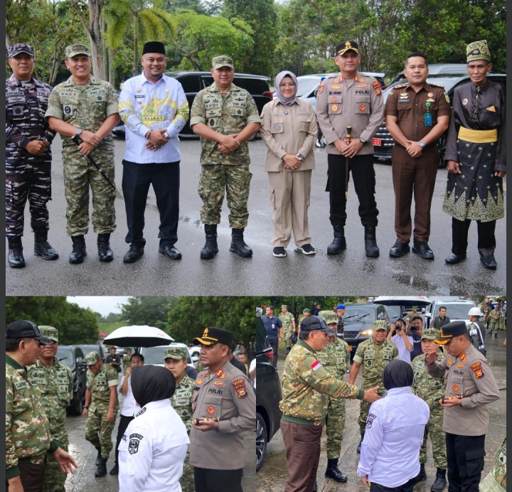 Di Tengah Guyuran Hujan, Kapolres Siak Sambut Kedatangan Menhan RI, Kunjungan ke Yonif TP 851/BBC Berlangsung Aman